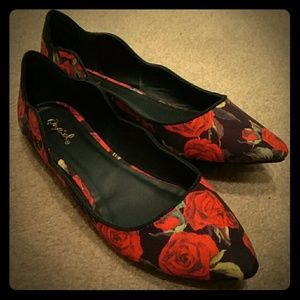 Red roses black flats